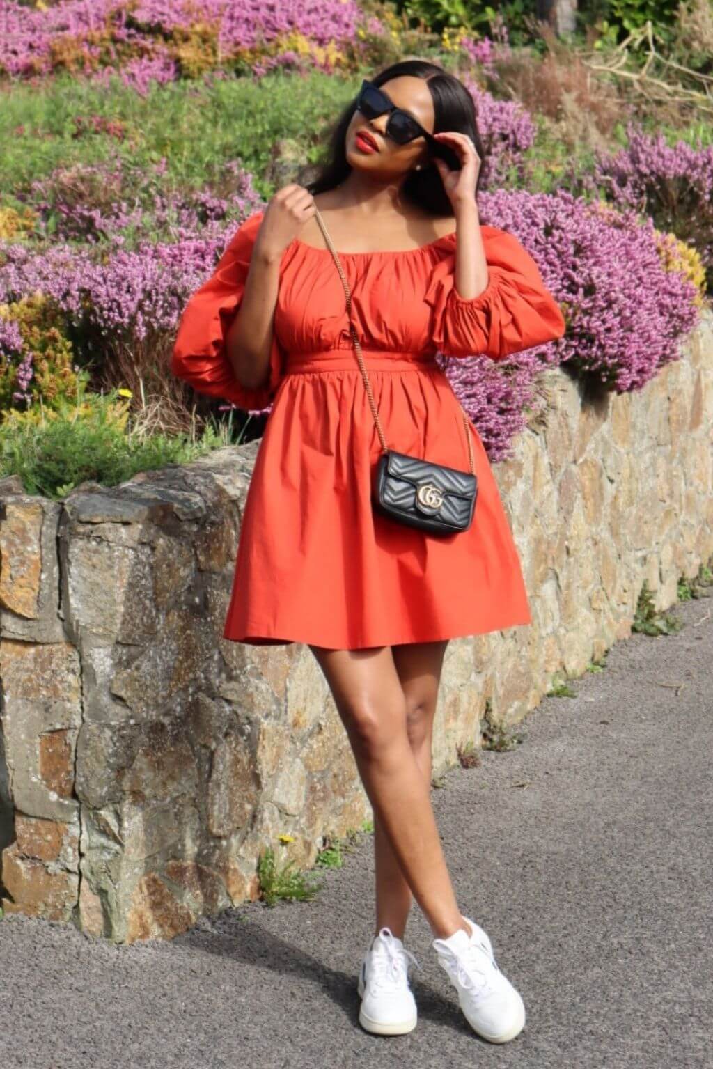The stunning Burnt Orange Poplin Dress gives you that chic and luxe look. The fitted waist snatches you together giving you that hourglass body shape and puff sleeves will let everybody know the fashion queen has arrived.