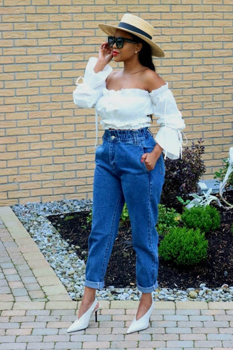This beautiful top is perfect for days when you want to be comfortable, yet still feel sexy. The gathered bust perfectly contours your curves, while the long sleeves cover the bulge in the upper arm that most women don&#39;t like to show. Featuring off-shoulder style with ruffled hem, this white crop top is everything you need.