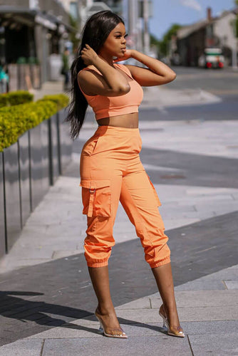 Our Orange Cargo Pants are the perfect addition to your wardrobe! Made with our signature poplin material, they provide unbeatable comfort and style. Pair with your favourite top for a complete look.