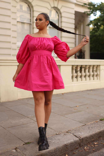 Our Puff-sleeved cotton Poplin dress is every girls wardrobe essentials. This pink dress goes with anything, leaving you looking classy and of course, getting all the attention. With its small puff-sleeves that contour your shoulders it gives you that flattering look you will love. Its self belt gives extra security on how tight you want to feel.