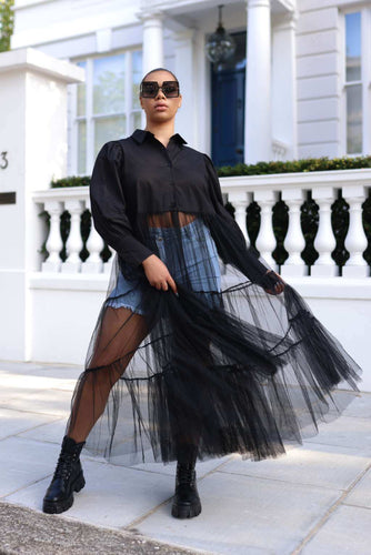 The Black Sheer Tulle Shirt Dress is a unique design with many styling options. The dress comes in a beautiful lace, stretchy fabric that can be paired with tights and boots for the winter months or bare naked if that’s your style. Wear it alone or layer it up with accessories, tights, and more! This dress is perfect year around.