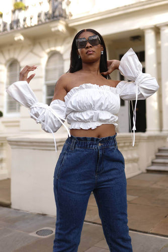 Get ready to become the next fashionista in a SETSOFRAN London crop top. Its gathered bust perfectly contours your curves. Featuring off-shoulder, ruffle hem and long elastic puffy sleeves. This top is everything you need.